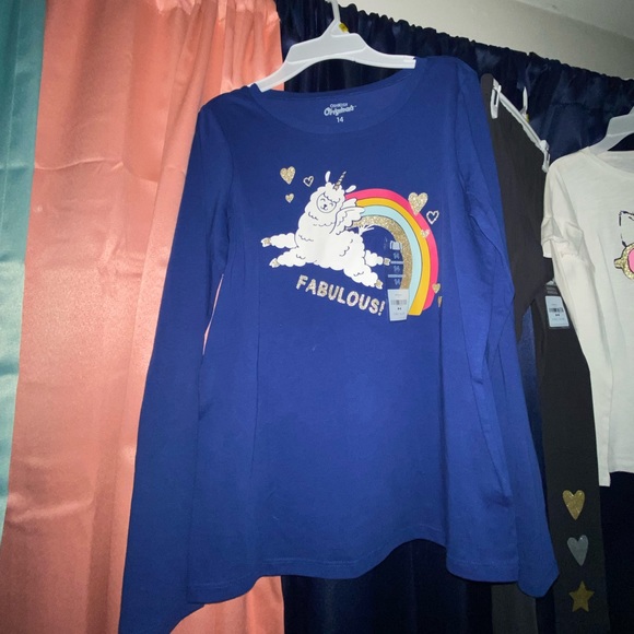 Two new long sleeved shirts with a pair of matching pants. - Picture 3 of 4